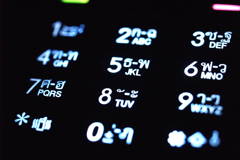 Glowing keypad of a feature phone